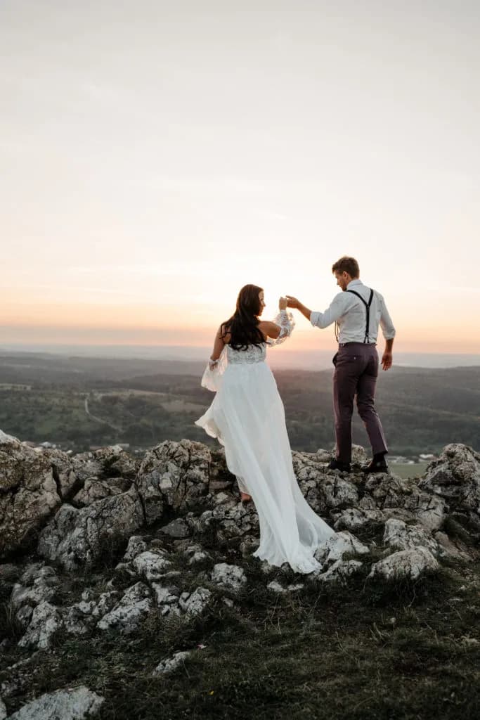 Bride and groom on cliff